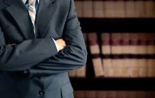 lawyer with arms crossed