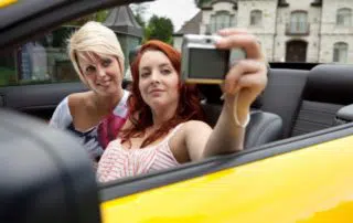 Taking a selfie while on a car