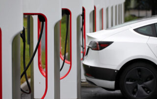 A Tesla charging its batteries prone to cause accidents